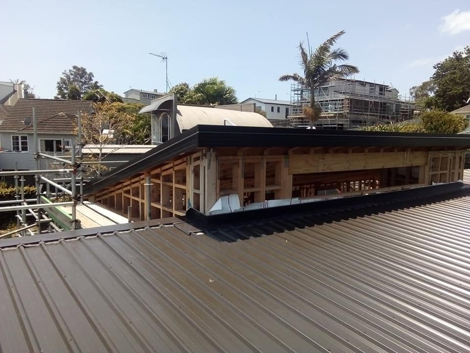 Villa re-roof in progress with exposed timber framing and a new roofline